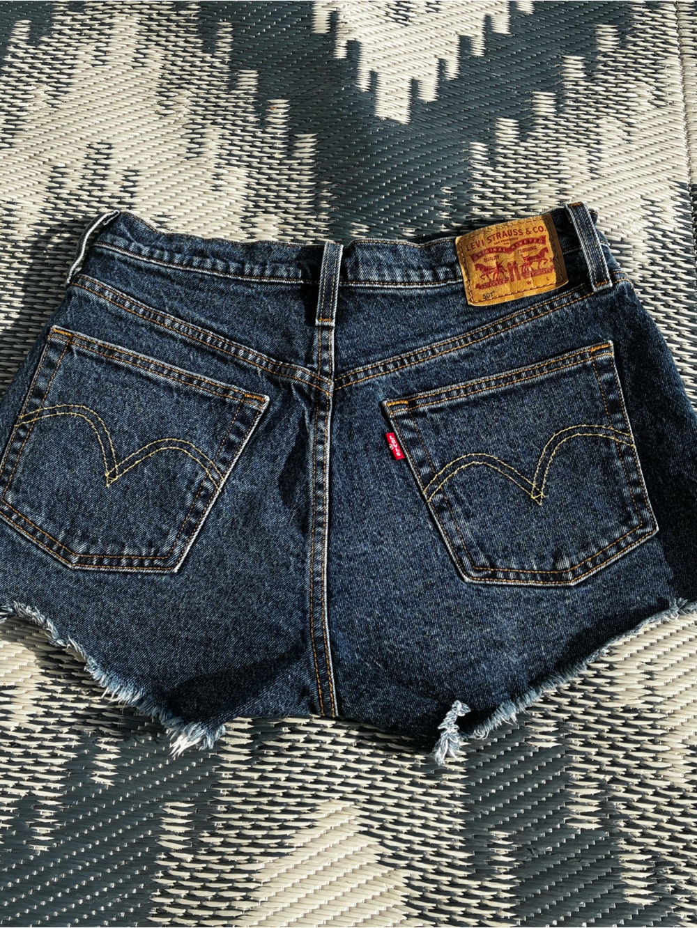 Levi's Women's Dark Blue Distressed Denim Cutoff Shorts
